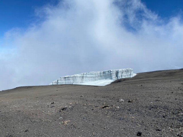 How much water should I drink while trekking Kilimanjaro?