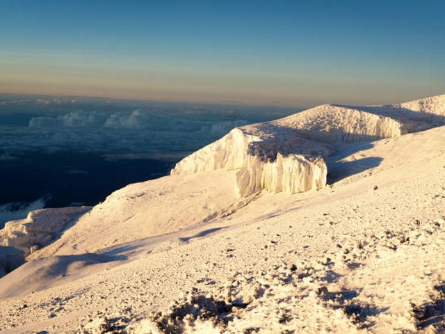 How does Kilimanjaro trekking impact the environment?